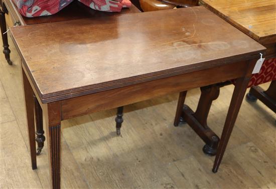 A George III mahogany folding tea table W.87cm